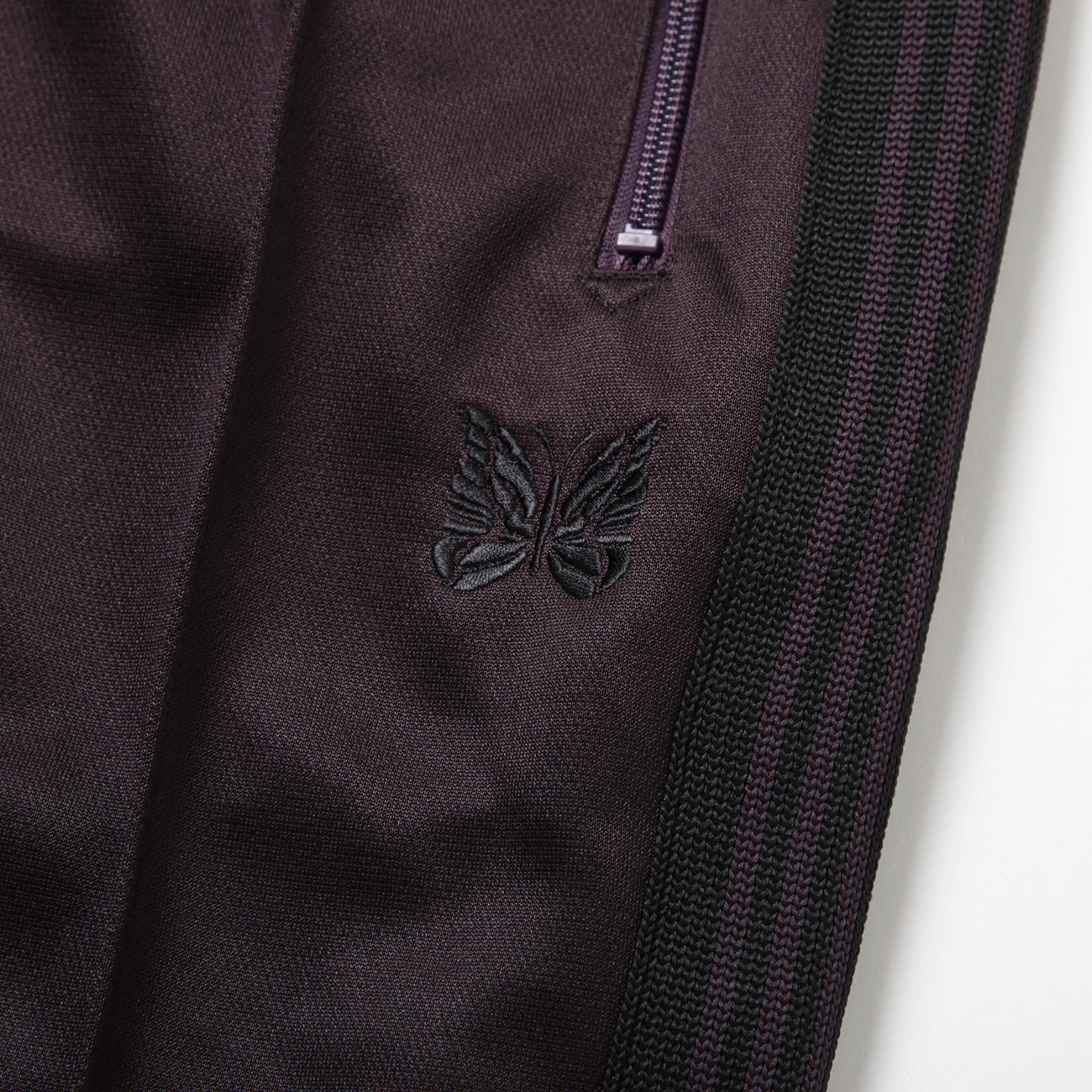 Needles / Narrow Track Pant サイドラインとブランドロゴ
